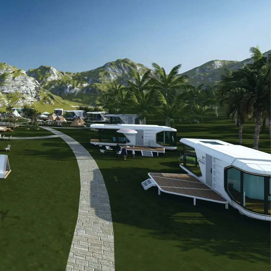 Modern mobile homes with mountain view and palm trees.