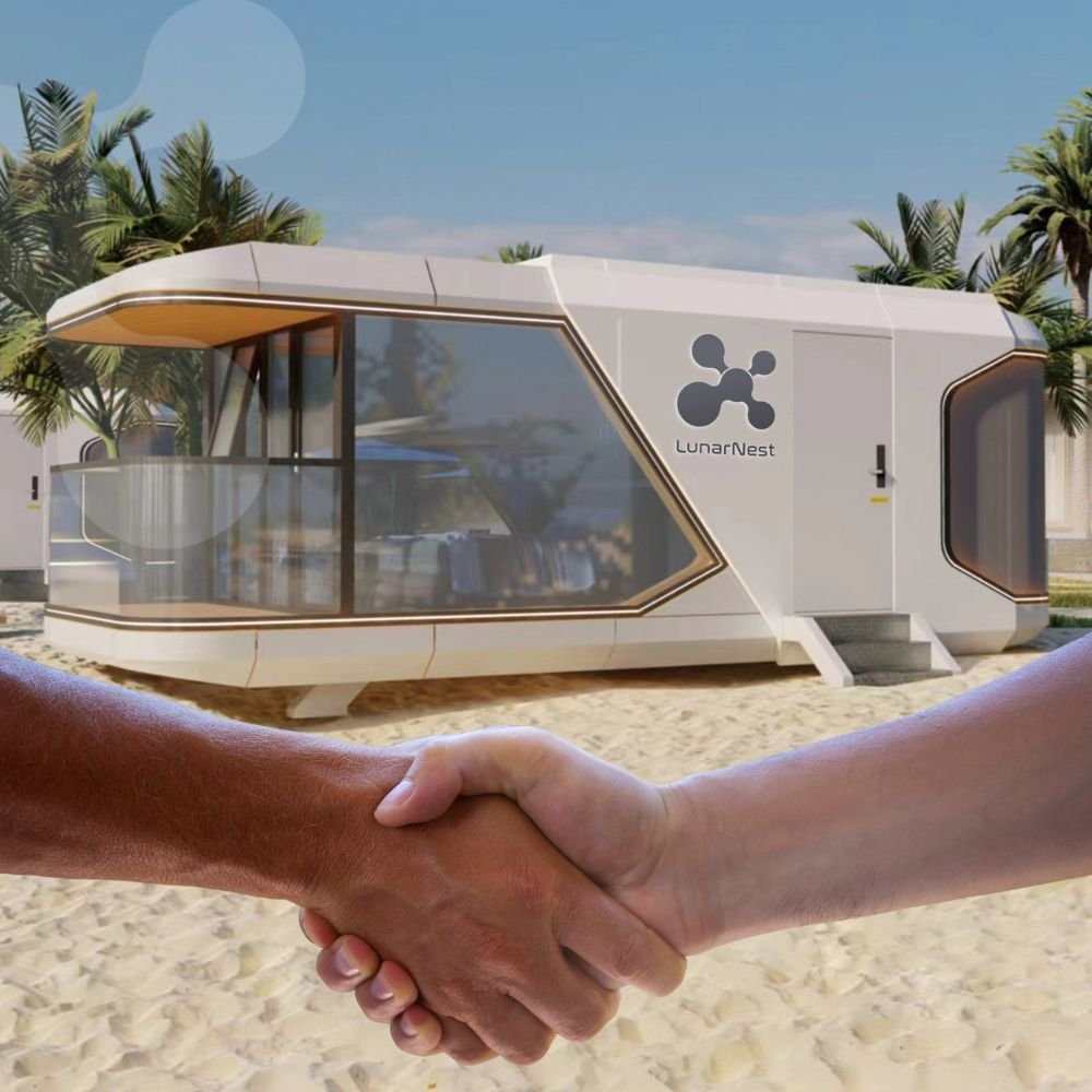 People shaking hands near modern beach container home.