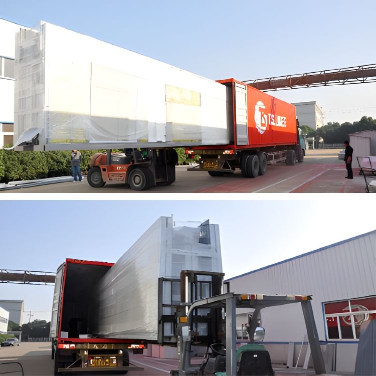 Loading large container onto truck with forklift.
